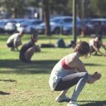 Group Squat on Grass